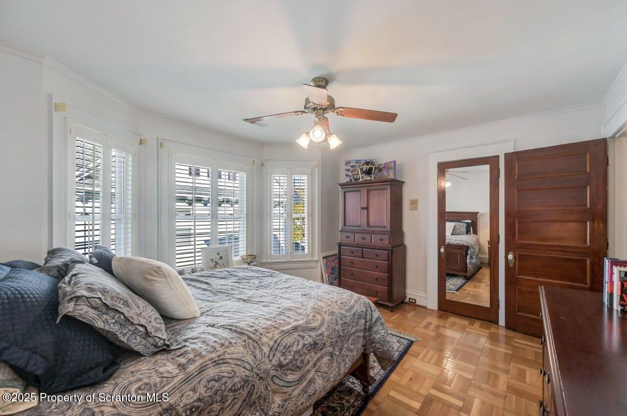 1118 Columbia Street Scranton, PA 18509 - Photo 58 of 92 a bedroom with a bed closet and a large window