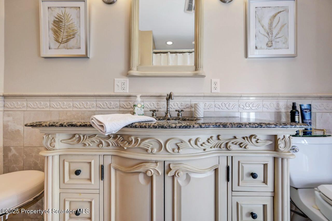 1118 Columbia Street Scranton, PA 18509 - Photo 63 of 92 a view of a kitchen with stainless steel appliances granite countertop a stove and a sink