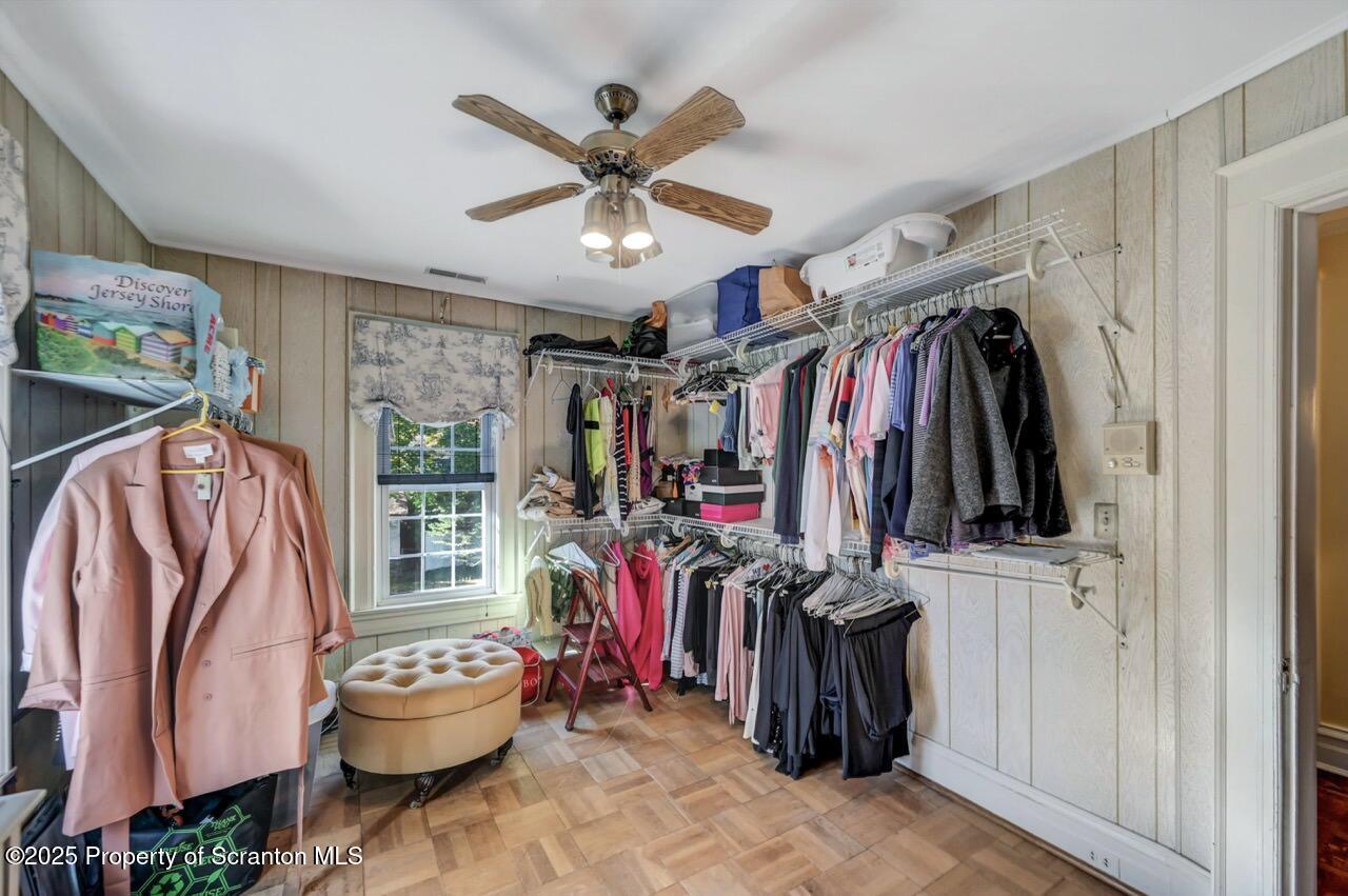 1118 Columbia Street Scranton, PA 18509 - Photo 66 of 92 a view of walk in closet with clothes and shoes