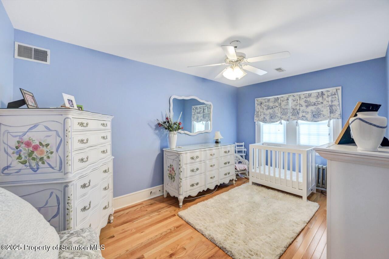 1118 Columbia Street Scranton, PA 18509 - Photo 75 of 92 a bedroom with a bed and a dresser in it