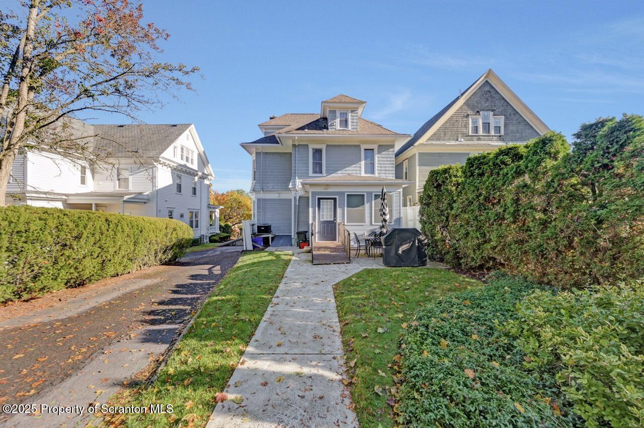 1118 Columbia Street Scranton, PA 18509 - Photo 88 of 92 a front view of a house with a yard