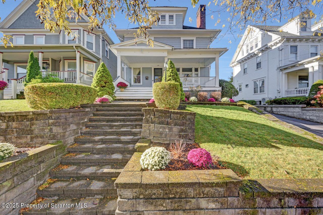 1118 Columbia Street Scranton, PA 18509 - Photo 91 of 92 a front view of a house with garden