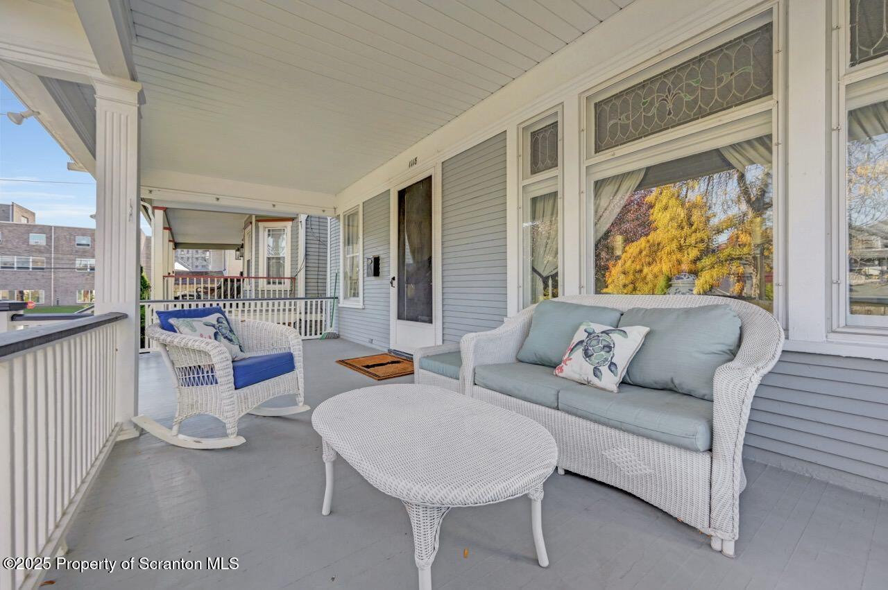 1118 Columbia Street Scranton, PA 18509 - Photo 10 of 92 a living room with furniture and a large window