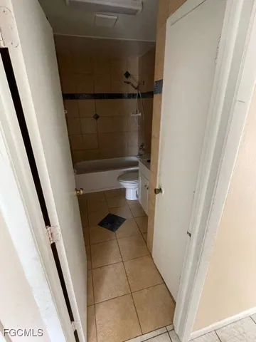 a bathroom with a sink and toilet