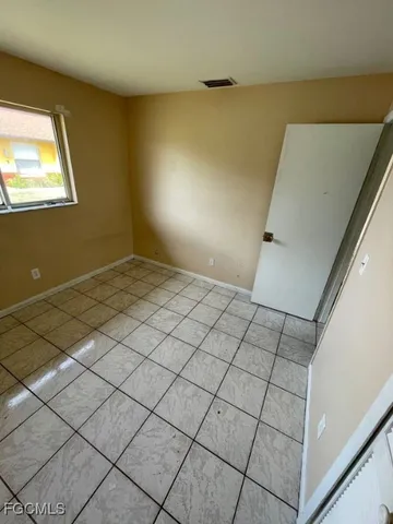 a kitchen with stainless steel appliances a stove a sink and a refrigerator