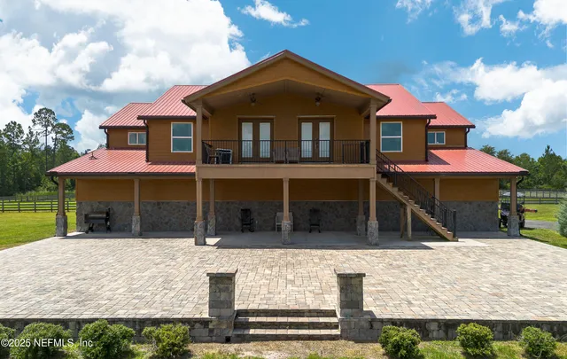 a front view of a house with yard