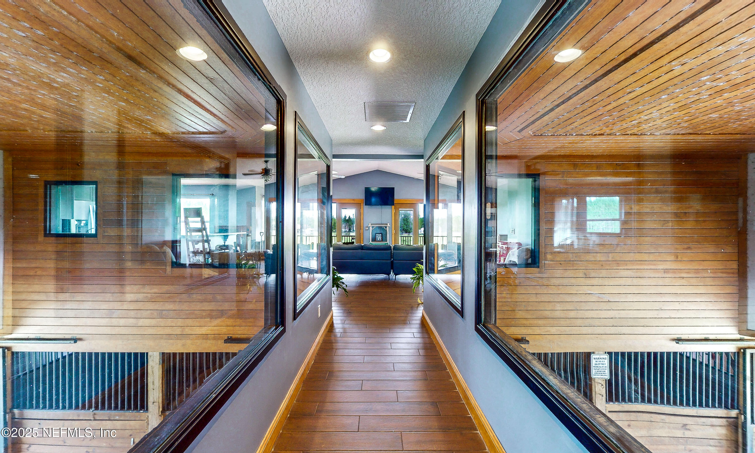 1845 Kinard Road Bryceville, FL 32009 - Photo 13 of 86 Hallway-Horse Stall Views