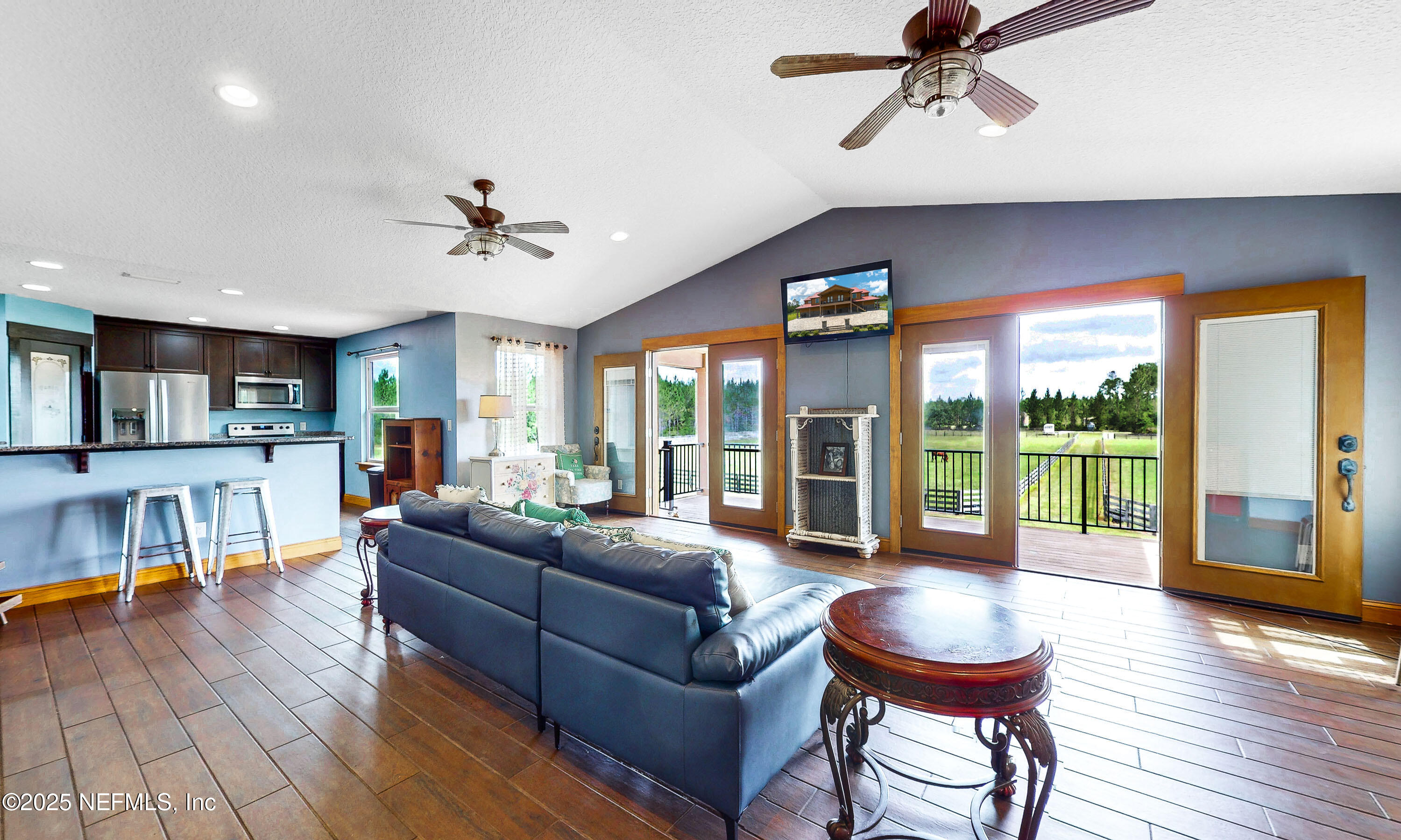 1845 Kinard Road Bryceville, FL 32009 - Photo 18 of 86 a living room with furniture and a large window