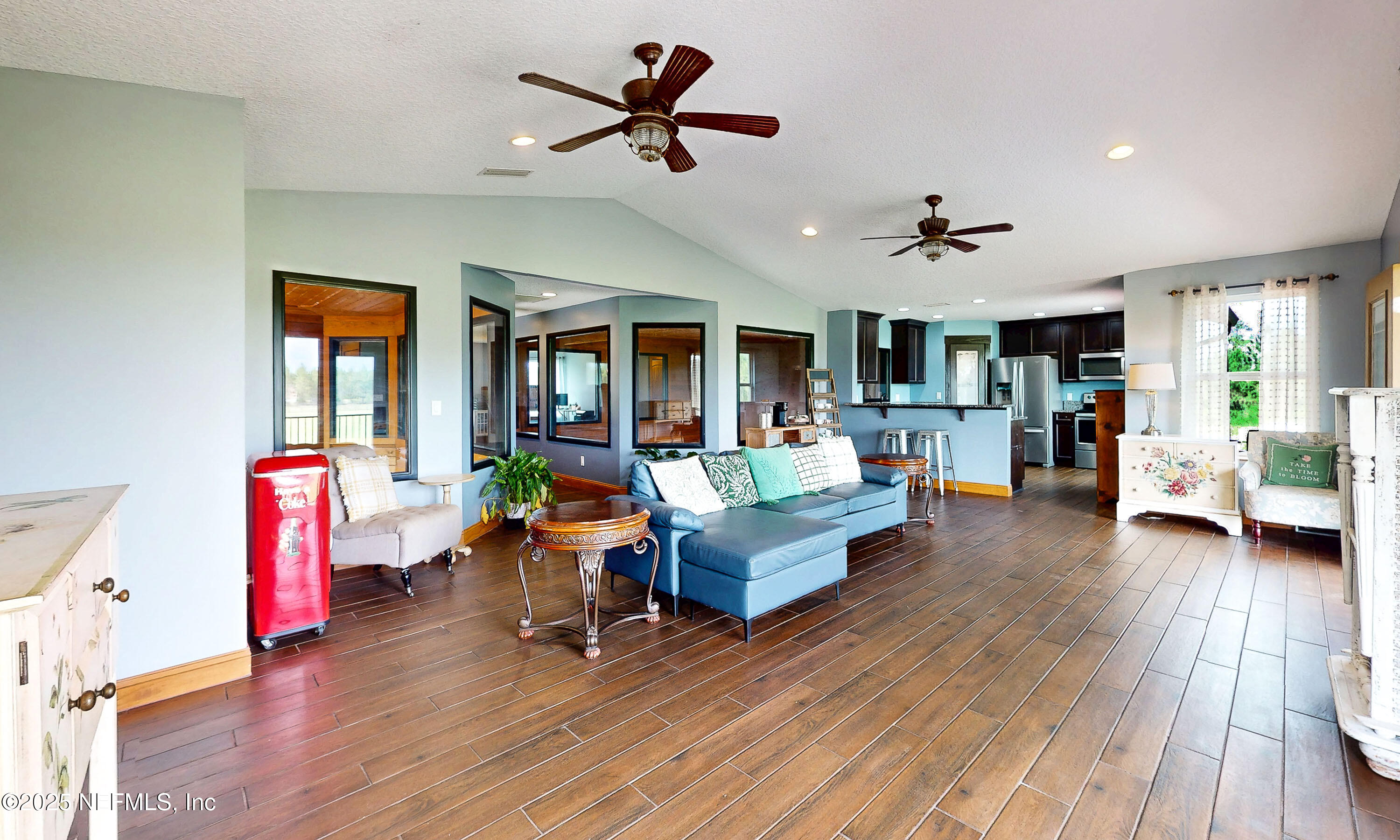 1845 Kinard Road Bryceville, FL 32009 - Photo 19 of 86 a living room with furniture and wooden floor