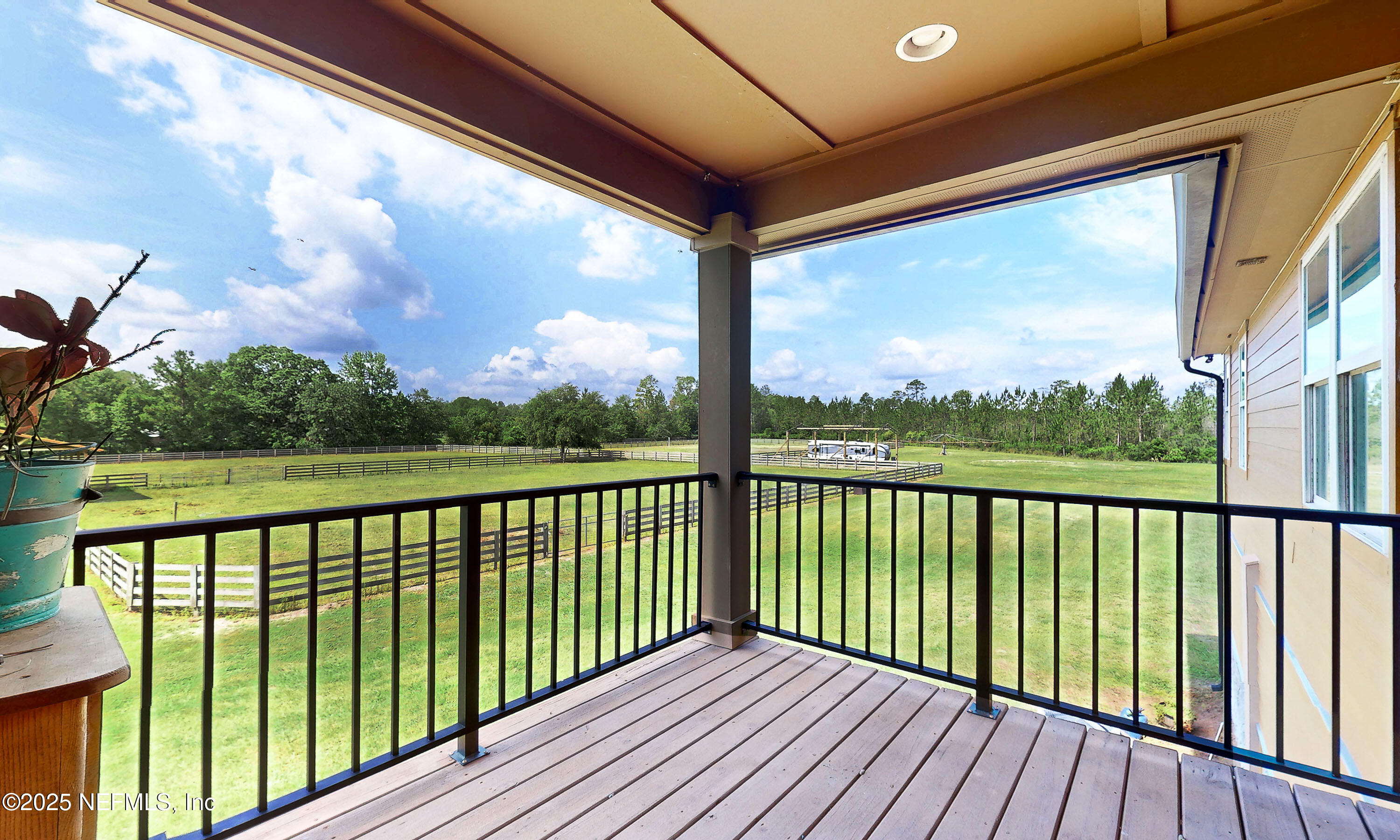 1845 Kinard Road Bryceville, FL 32009 - Photo 32 of 86 a view of balcony with wooden floor