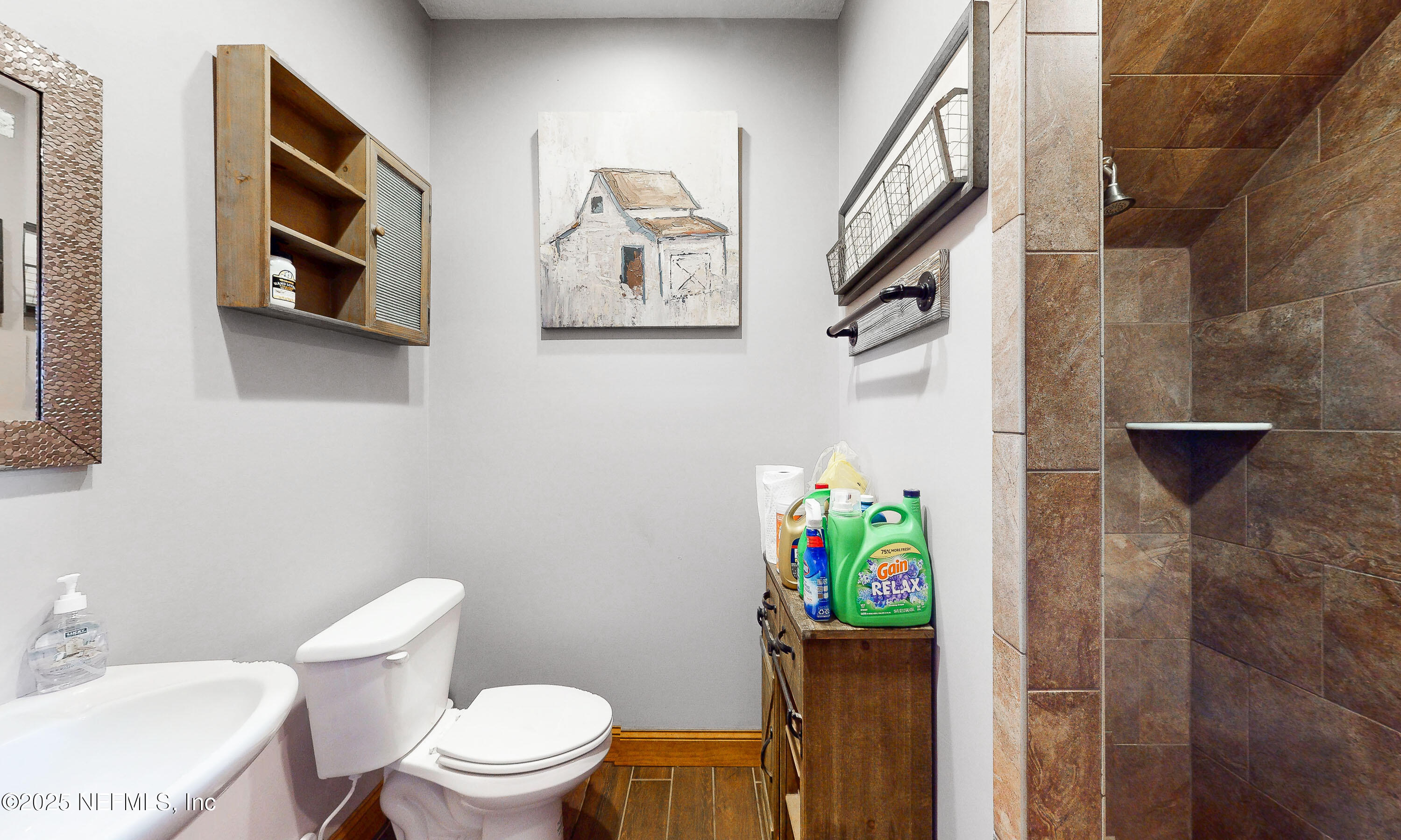 1845 Kinard Road Bryceville, FL 32009 - Photo 41 of 86 a bathroom with a toilet and a shower