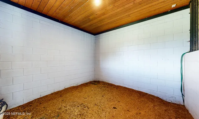 a room with furniture and a window