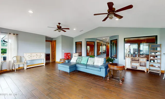 a view of a balcony with lake view and a floor to ceiling window