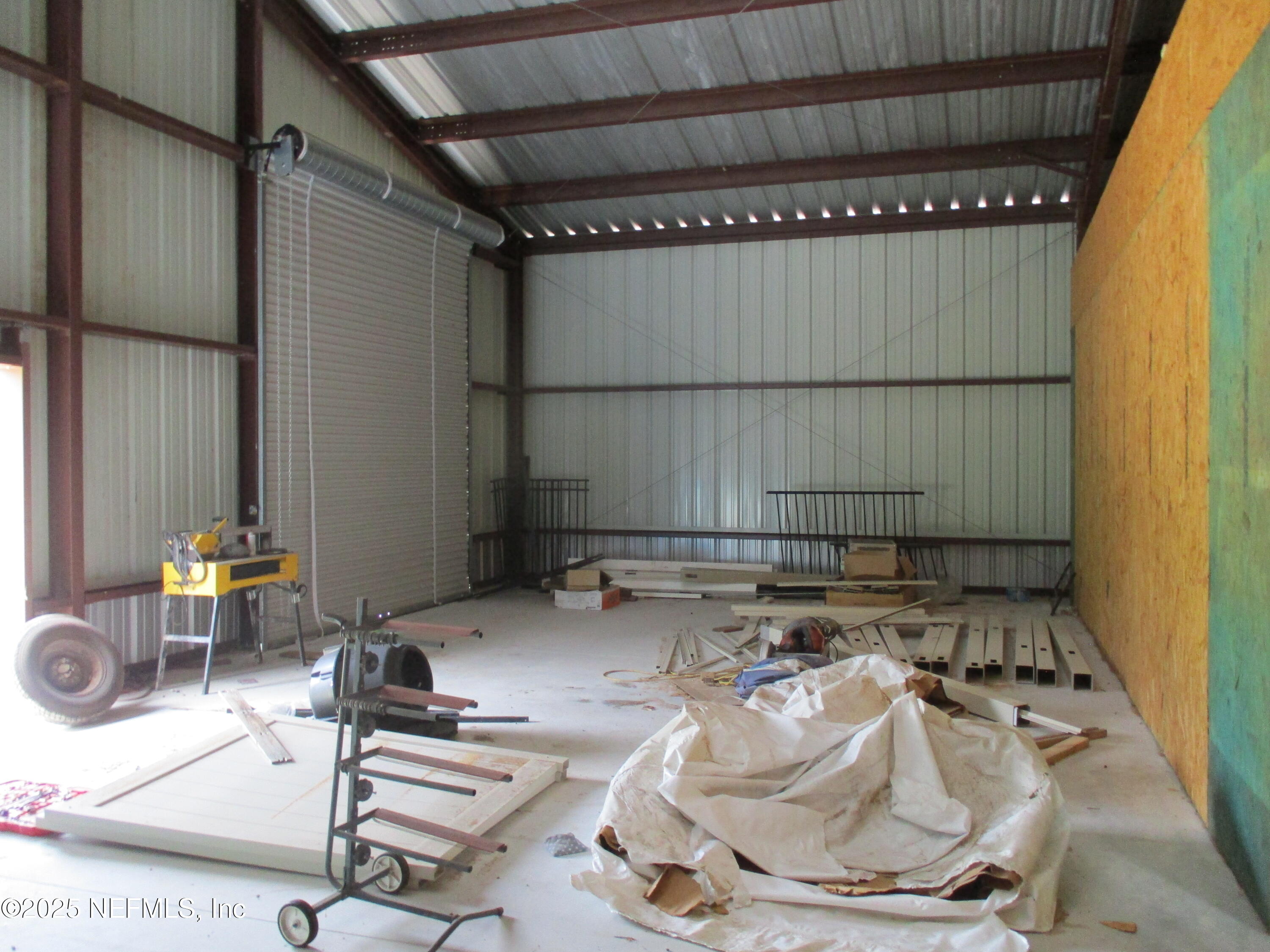 1845 Kinard Road Bryceville, FL 32009 - Photo 81 of 86 a room with furniture and a window