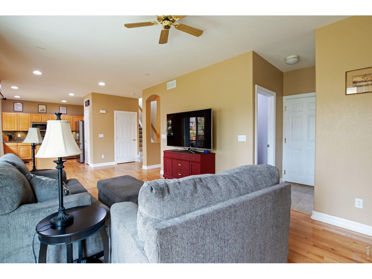 615 Americana Road Longmont, CO 80504 - Photo 19 of 47 Family room to kitchen