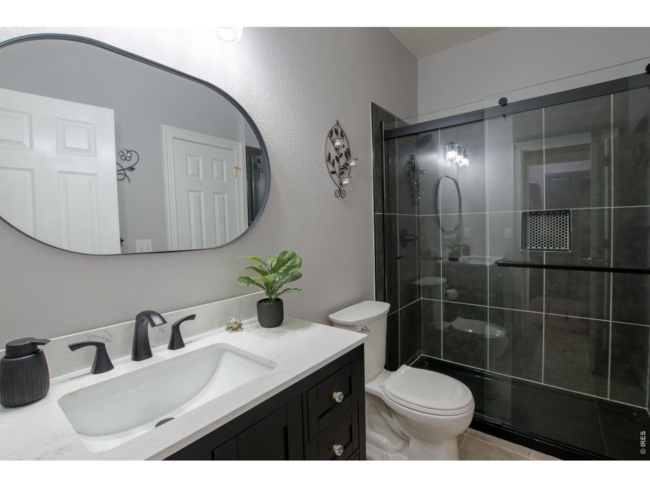 615 Americana Road Longmont, CO 80504 - Photo 21 of 47 Remodeled main floor bath