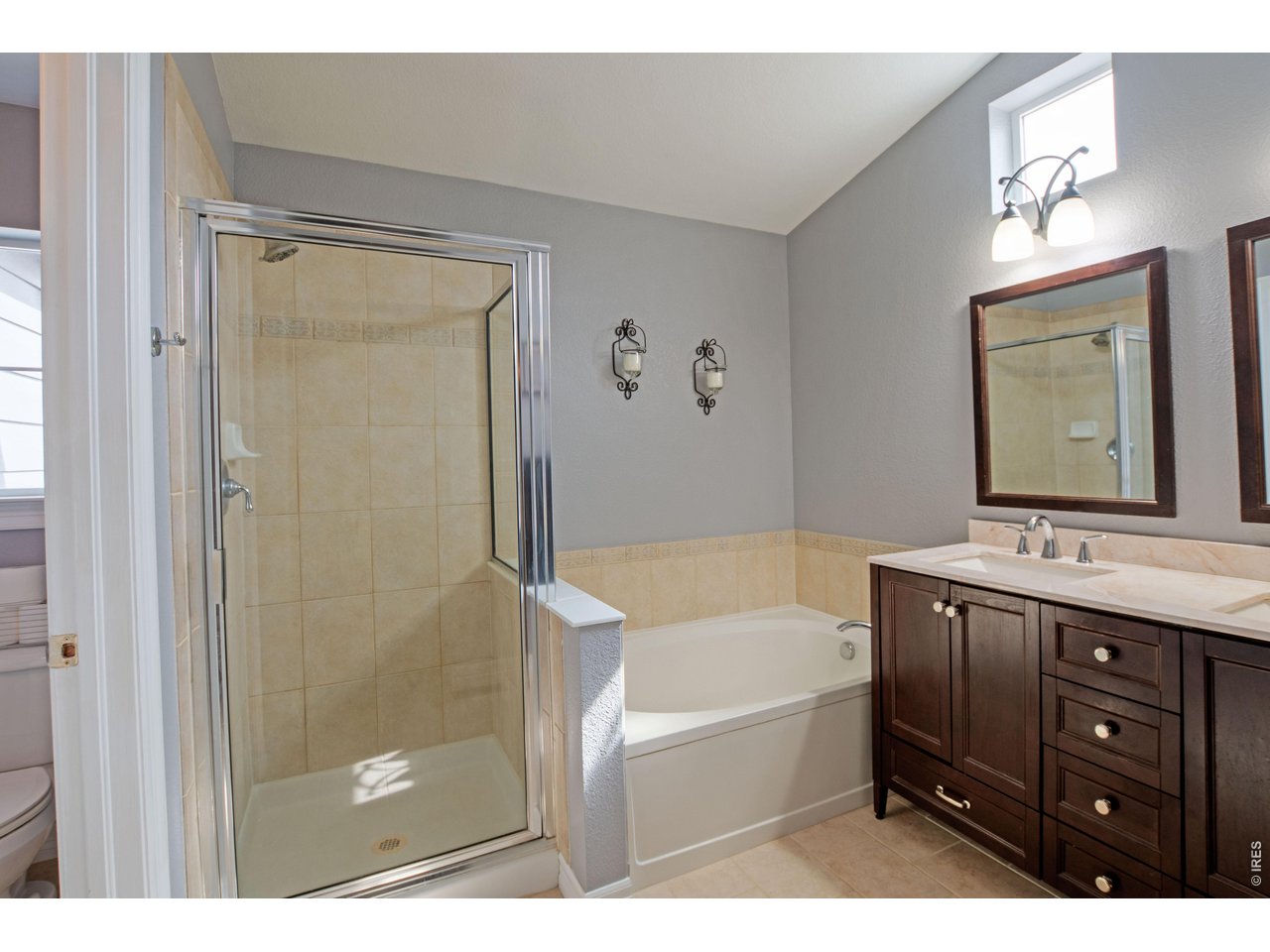 615 Americana Road Longmont, CO 80504 - Photo 27 of 47 Updated primary bath with heated floors