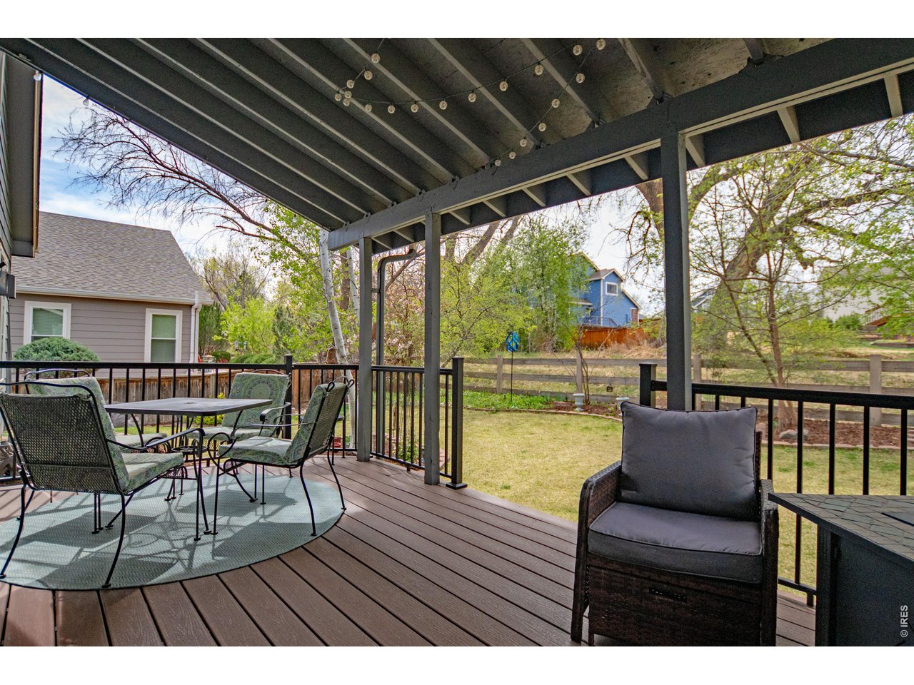 615 Americana Road Longmont, CO 80504 - Photo 40 of 47 Covered back patio with trex deck