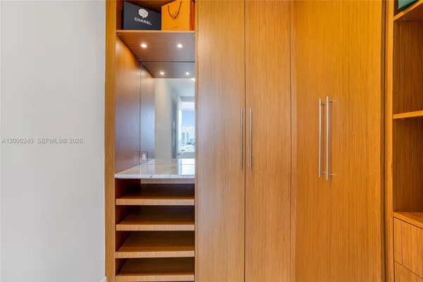 a kitchen with stainless steel appliances granite countertop a stove and a sink