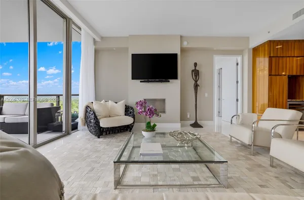 a kitchen with stainless steel appliances granite countertop a stove and a refrigerator