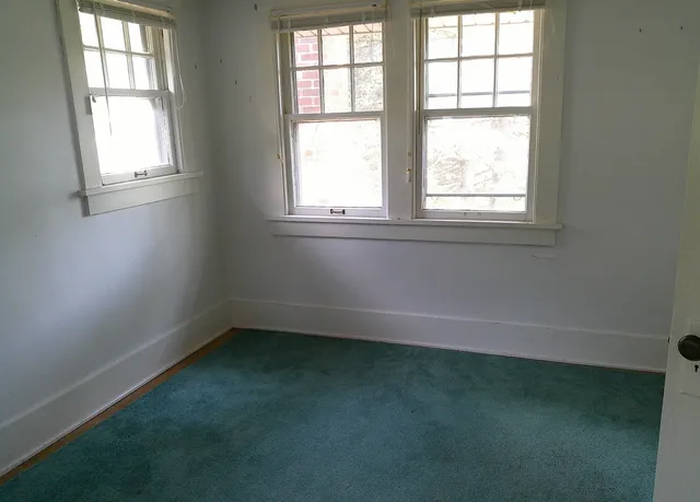 an empty room with a window