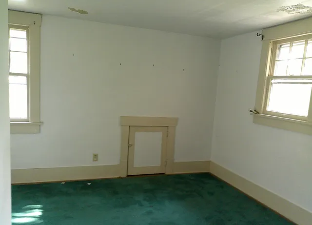 an empty room with a window