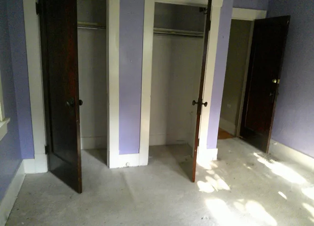 a view of a livingroom with wooden floor