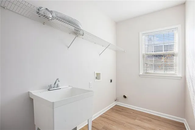 a bathroom with a sink and vanity