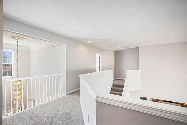 a view of kitchen and wooden floor