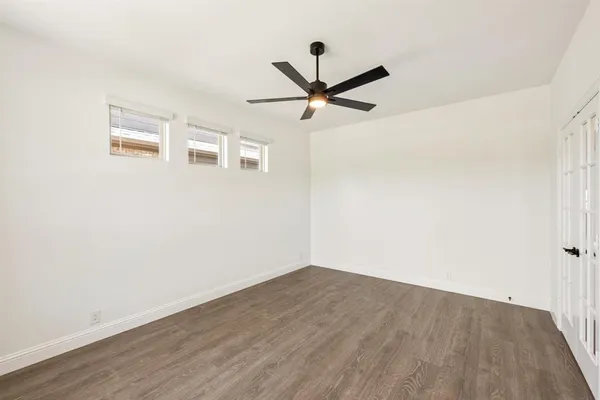 a view of a big room with wooden floor