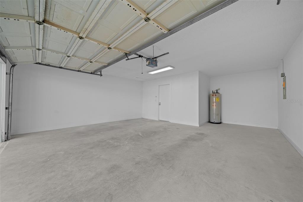 7556 Southwest 112th Lane Ocala, FL 34476 - Photo 30 of 37 a view of a room with a garage