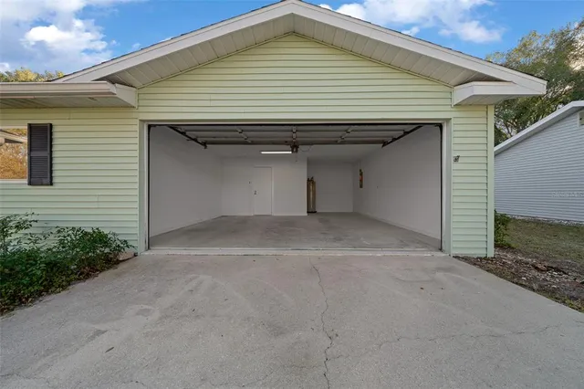a view of a house with garage