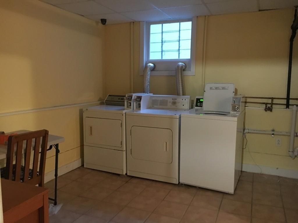 20 St Lukes Road, Unit 1 Boston, MA 02134 - Photo 10 of 10 a utility room with dryer and washer
