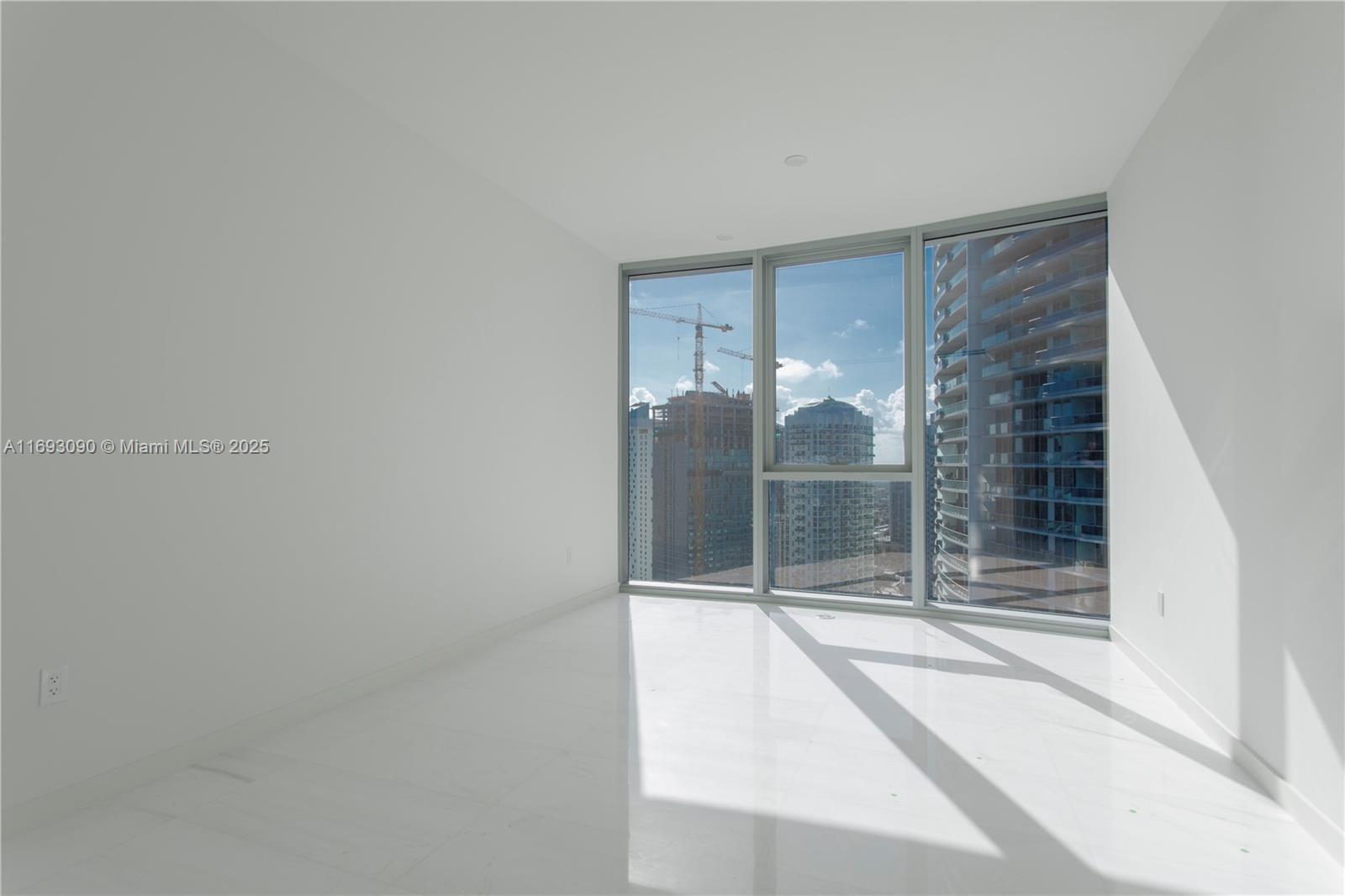 300 Biscayne Blvd Way, Unit 3307 Miami, FL 33131 - Photo 18 of 59 a bathroom with a glass shower door