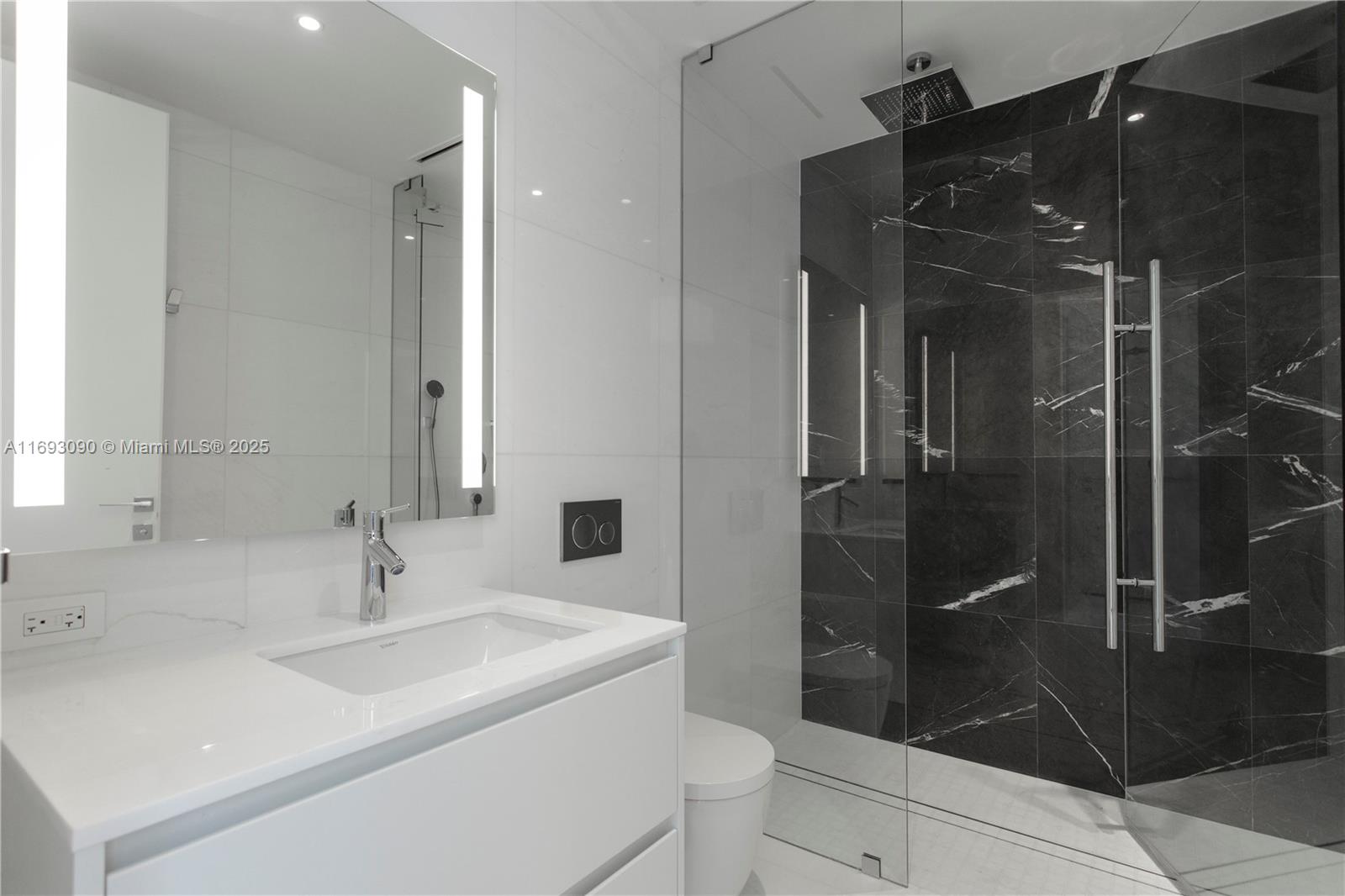 300 Biscayne Blvd Way, Unit 3307 Miami, FL 33131 - Photo 27 of 59 a bathroom with a shower and a sink