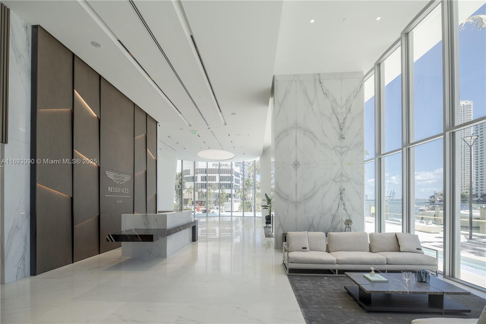 300 Biscayne Blvd Way, Unit 3307 Miami, FL 33131 - Photo 40 of 59 a living room with furniture and a large window