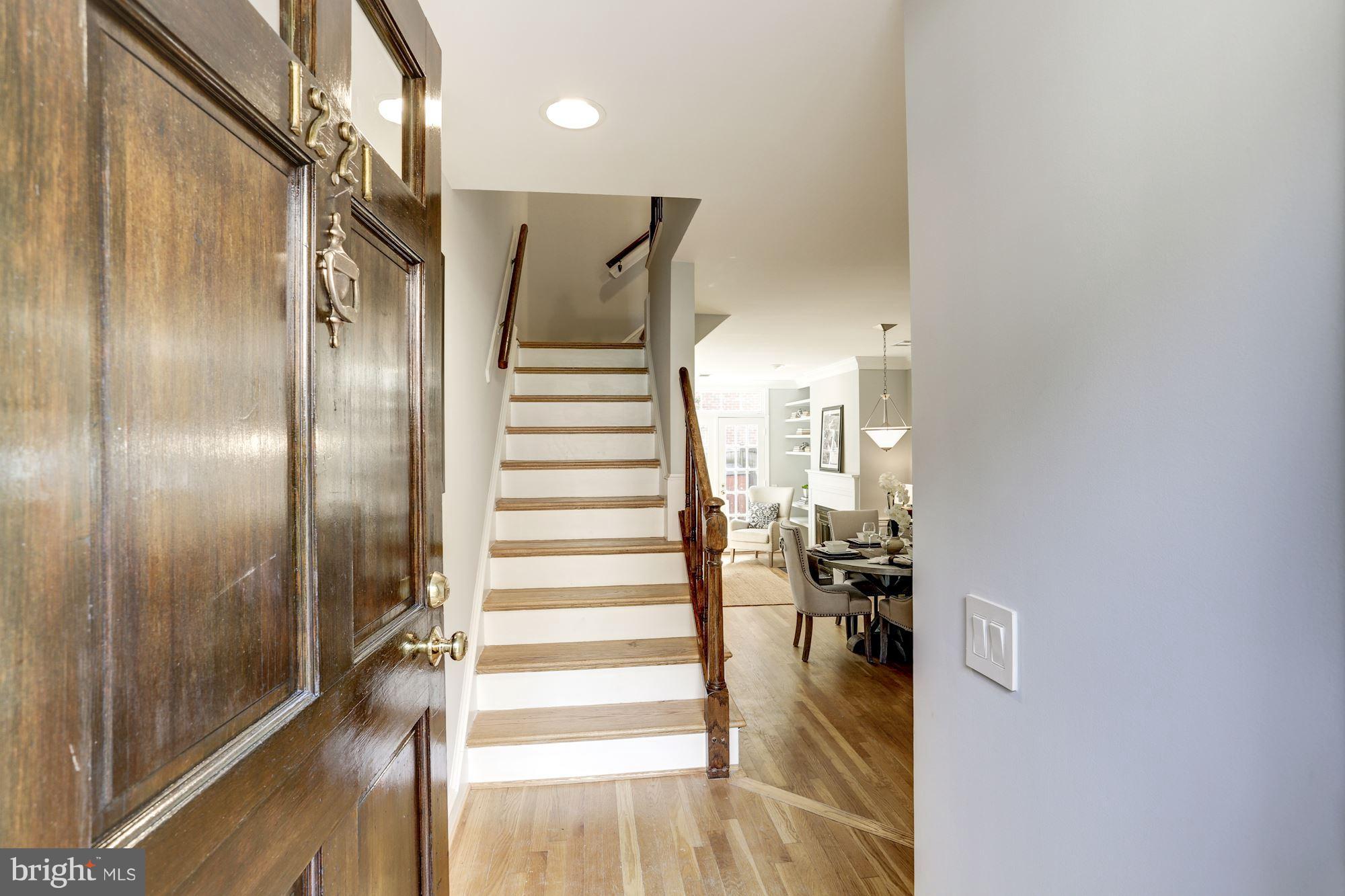 1221 Portner Road Alexandria, VA 22314 - Photo 2 of 30 a view of entryway and hall with wooden floor