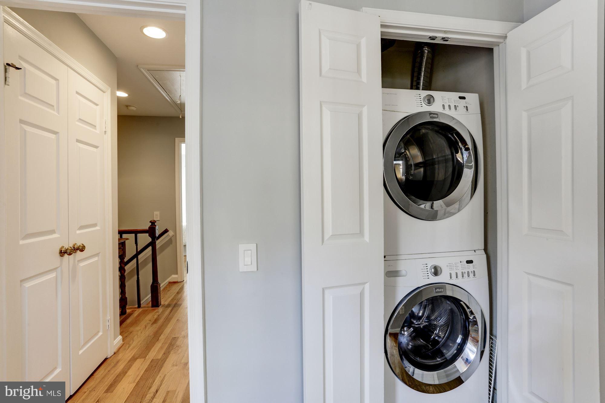 1221 Portner Road Alexandria, VA 22314 - Photo 14 of 30 a view of a hallway with washer and dryer