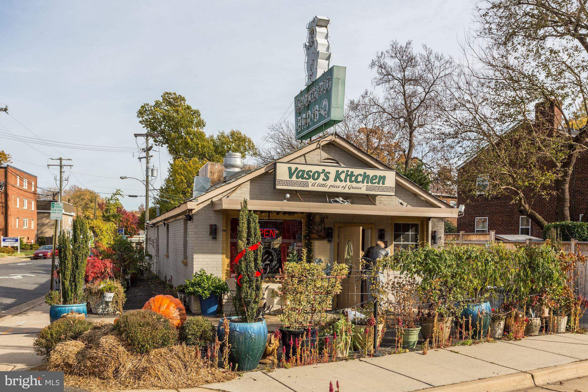 1221 Portner Road Alexandria, VA 22314 - Photo 19 of 30 a front view of a building with garden