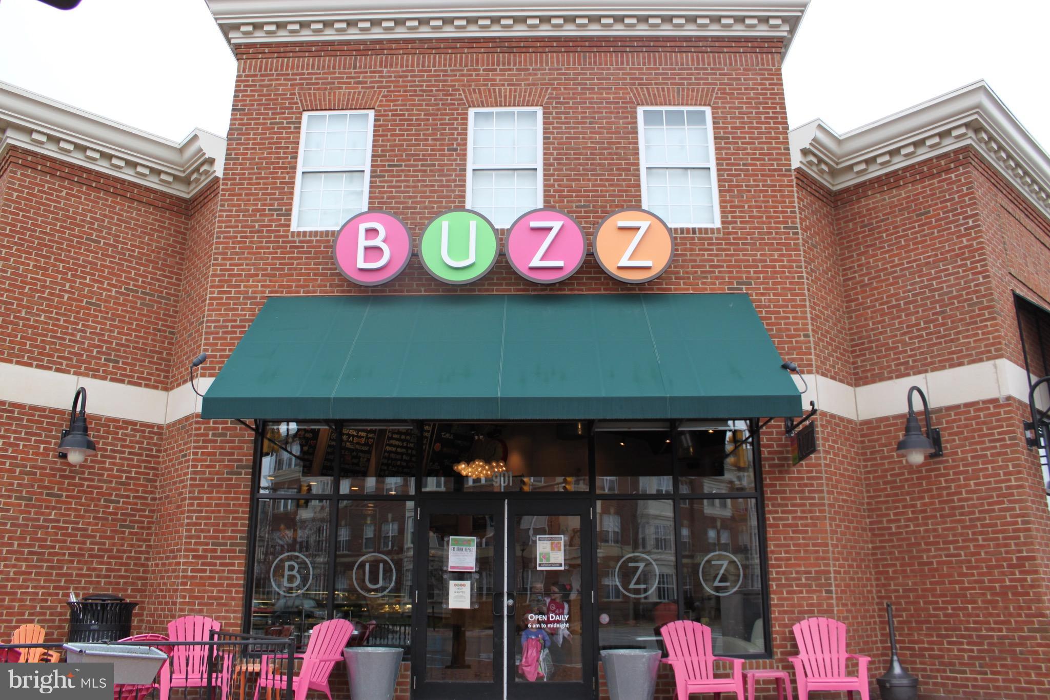 1221 Portner Road Alexandria, VA 22314 - Photo 21 of 30 a front view of a building with retail shops