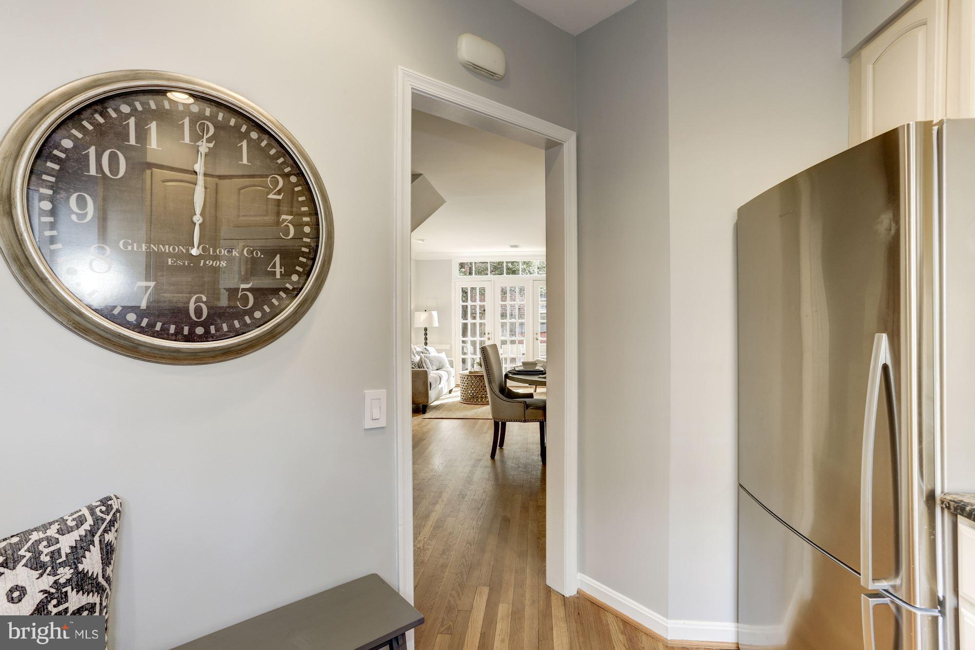 1221 Portner Road Alexandria, VA 22314 - Photo 7 of 30 a view of a livingroom with wooden floor and a window