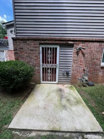 a view of a backyard of the house