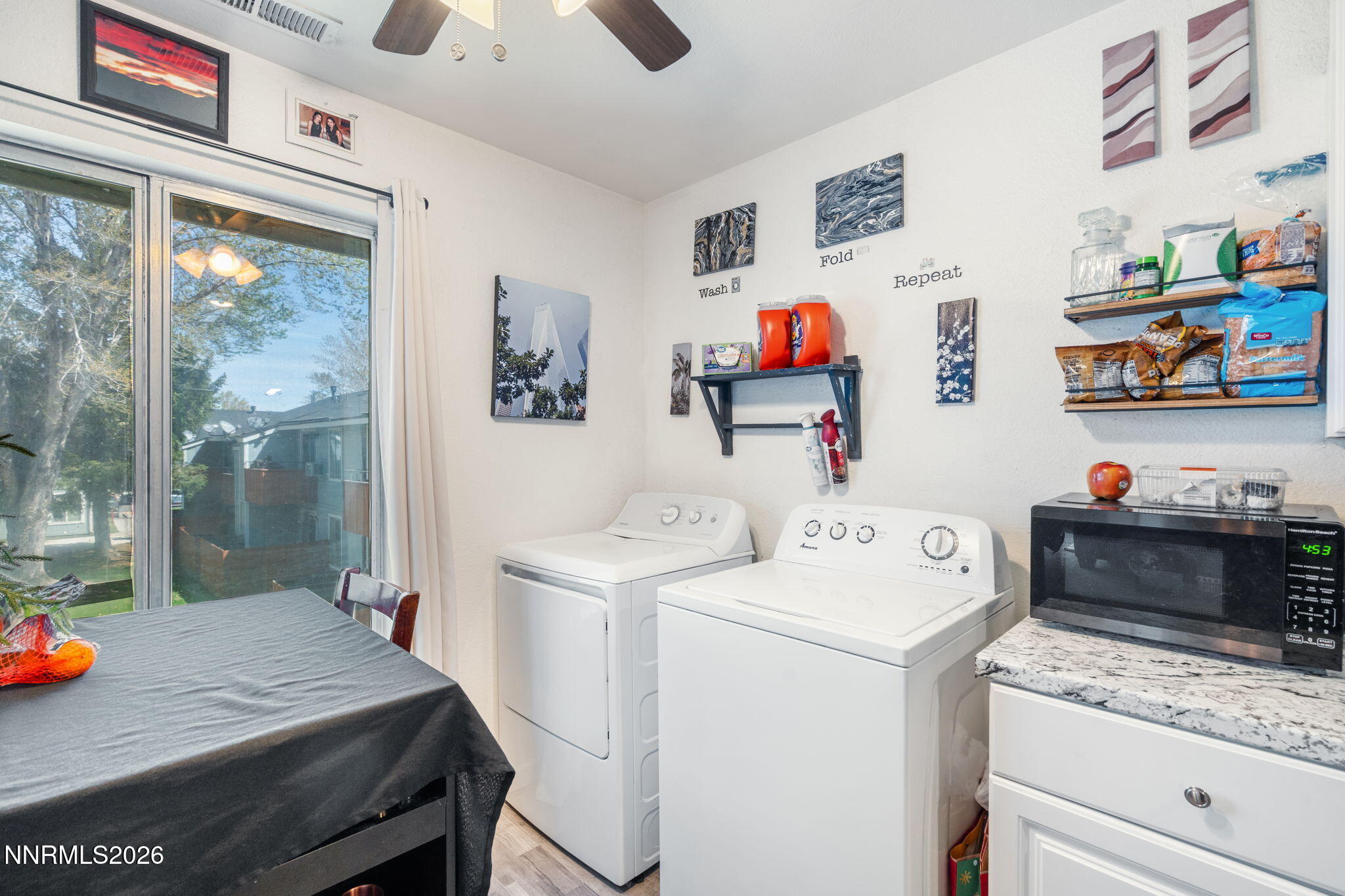 4604 Neil Road, Unit 164 Reno, NV 89502 - Photo 11 of 22 a utility room with dryer and washer