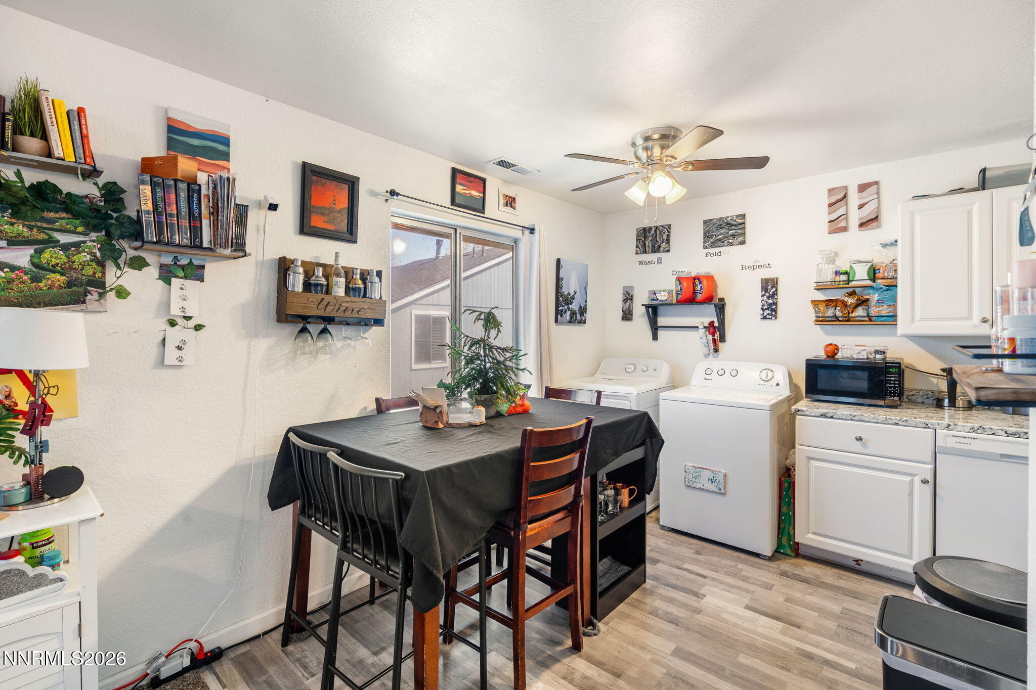 4604 Neil Road, Unit 164 Reno, NV 89502 - Photo 15 of 22 a room with storage and utility room