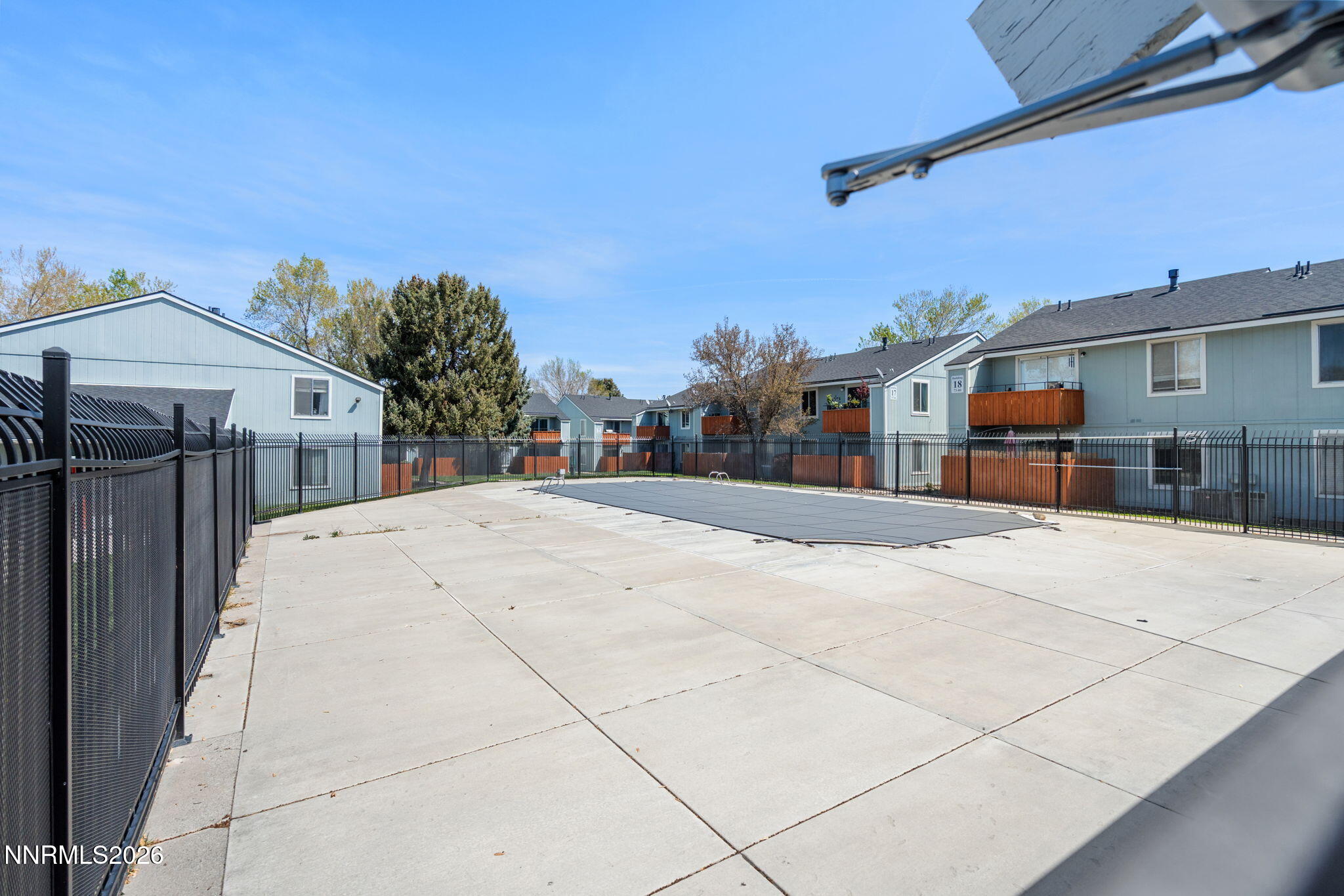 4604 Neil Road, Unit 164 Reno, NV 89502 - Photo 22 of 22 a view of a house with a snow in the background