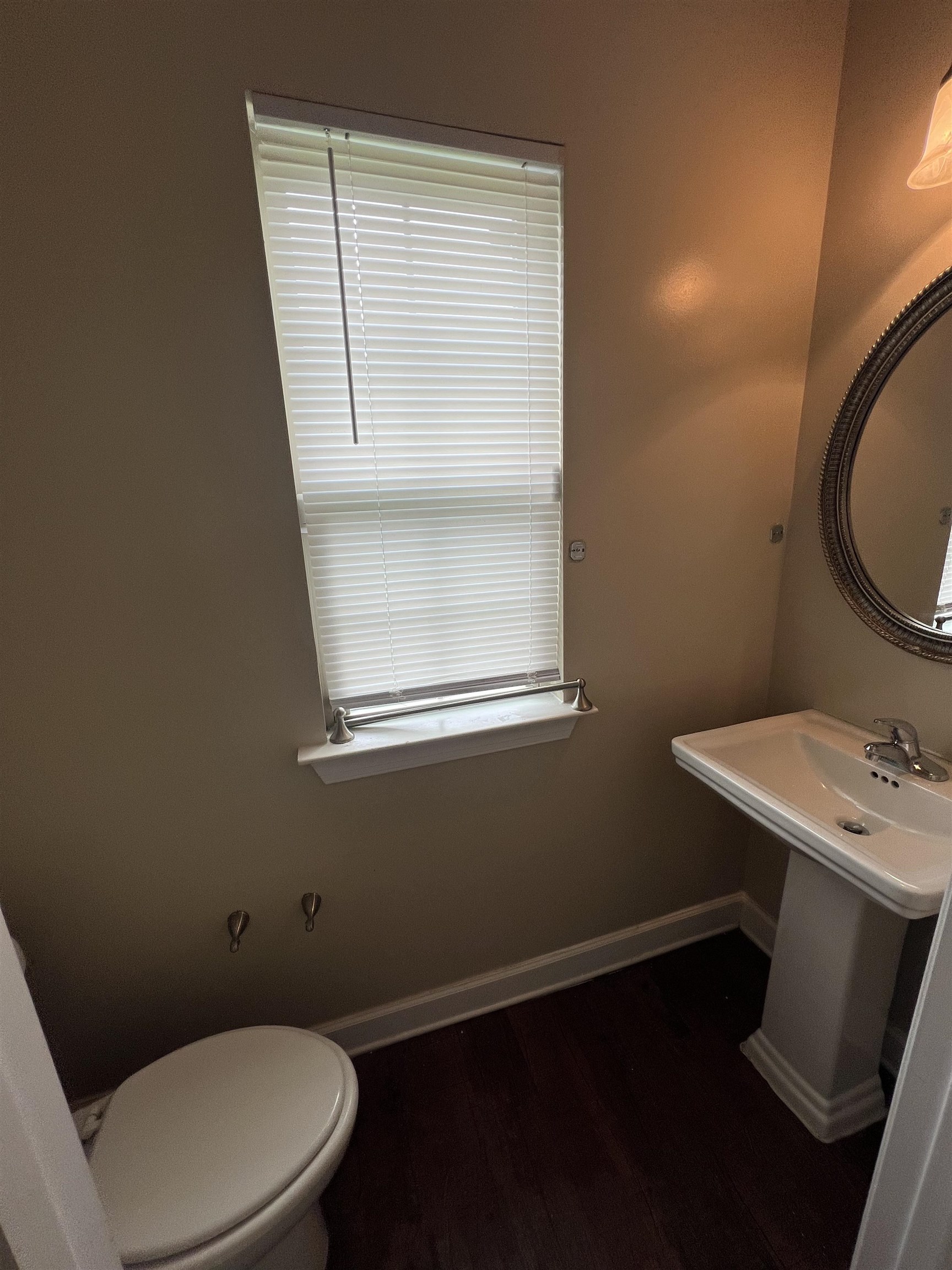 7317 Patsy Circle North Memphis, TN 38125 - Photo 13 of 26 Bathroom featuring toilet, baseboards, and wood finished floors