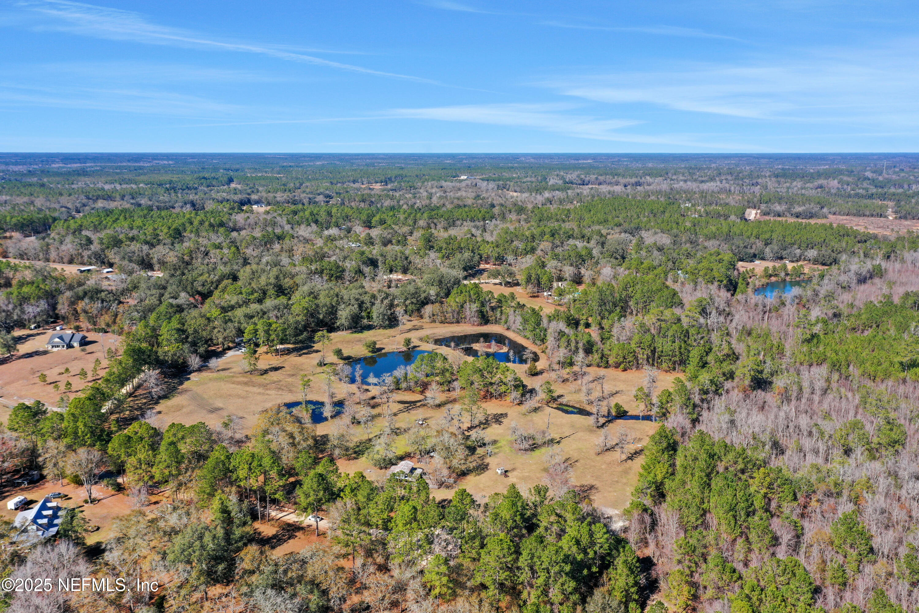 6769 Sandsdale Road Glen St. Mary, FL 32040 - Photo 1 of 31 a view of city and mountain