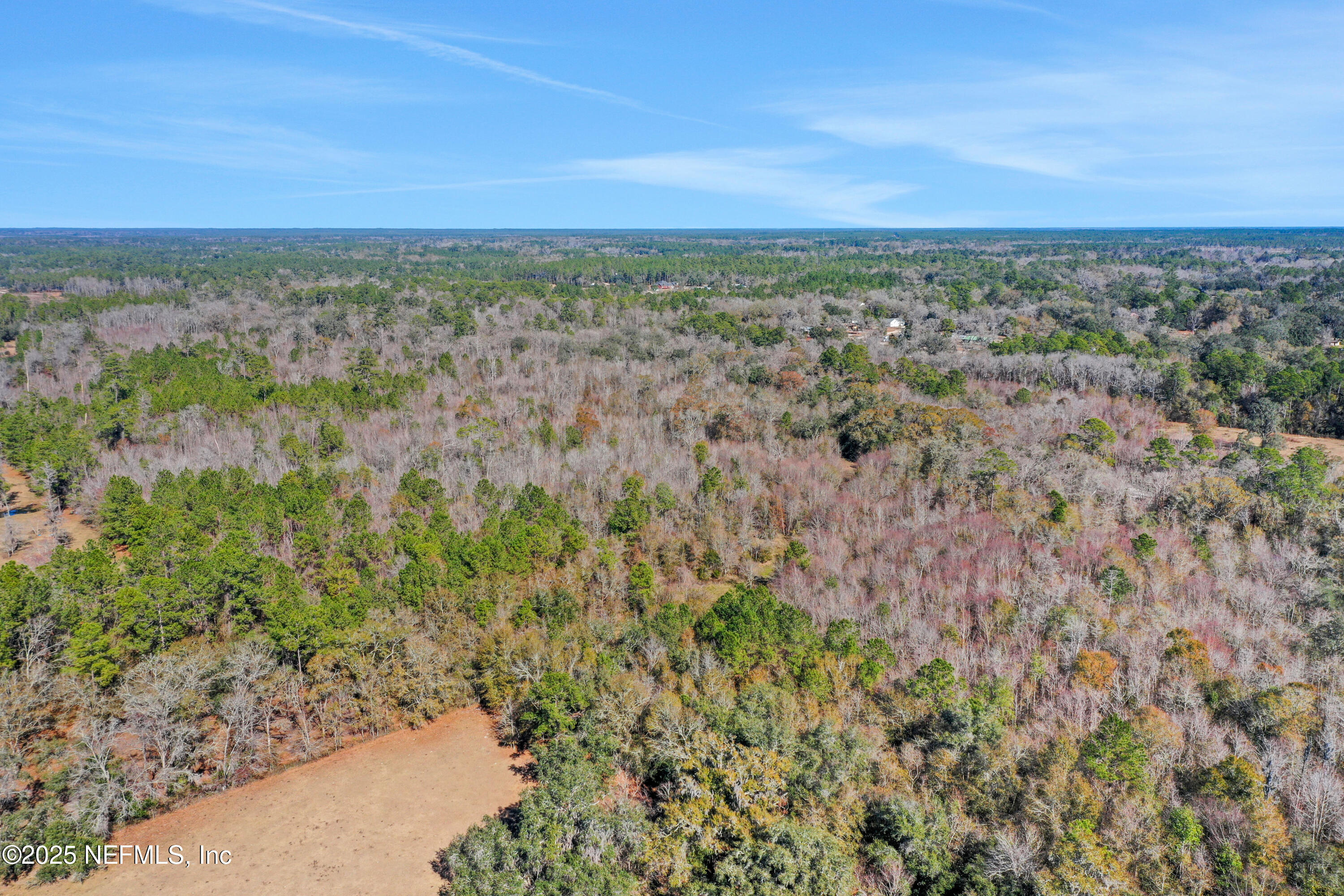 6769 Sandsdale Road Glen St. Mary, FL 32040 - Photo 14 of 31 a view of a field with a city view