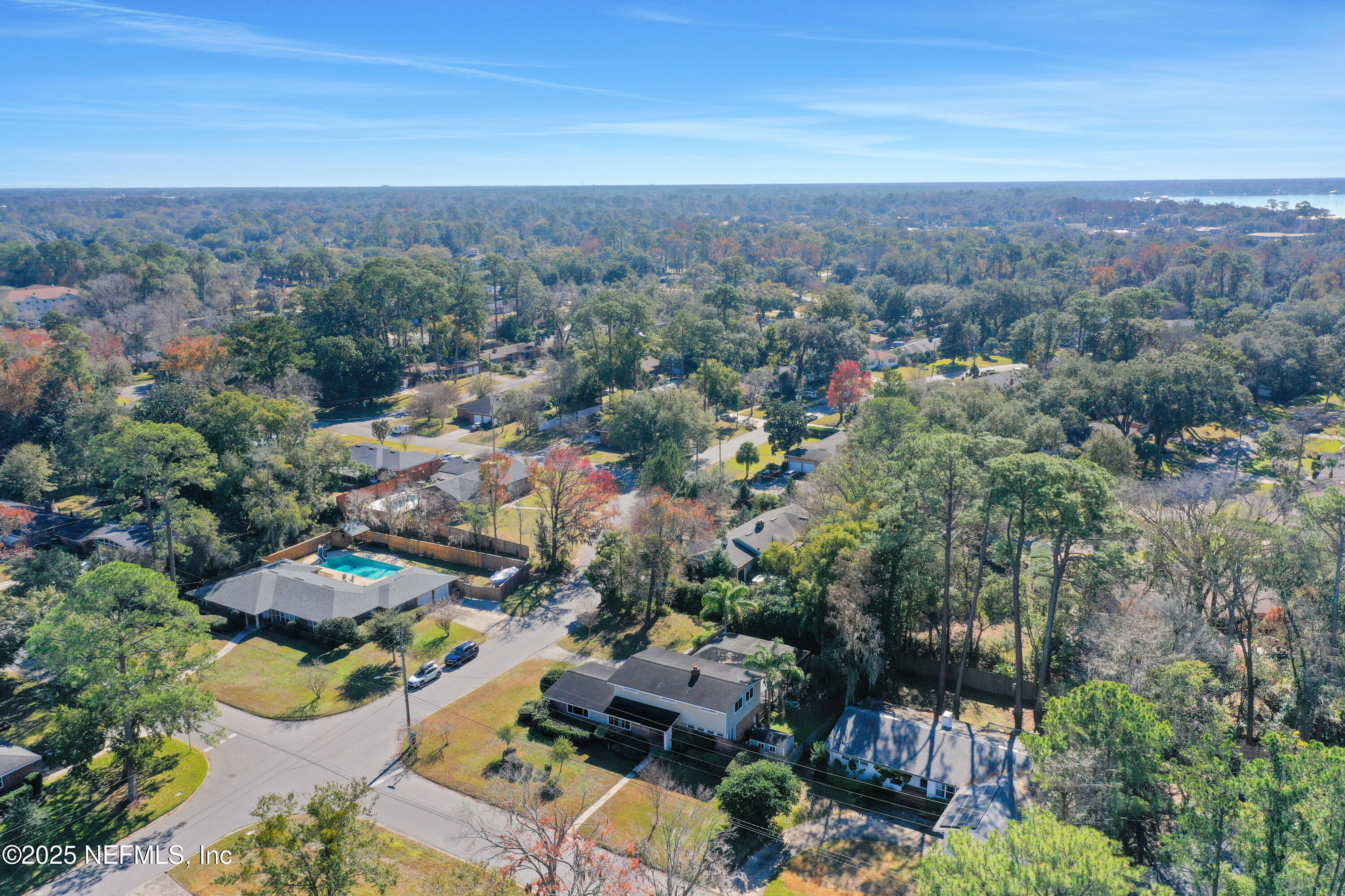 6769 Sandsdale Road Glen St. Mary, FL 32040 - Photo 23 of 31 an aerial view of residential houses with outdoor space and trees