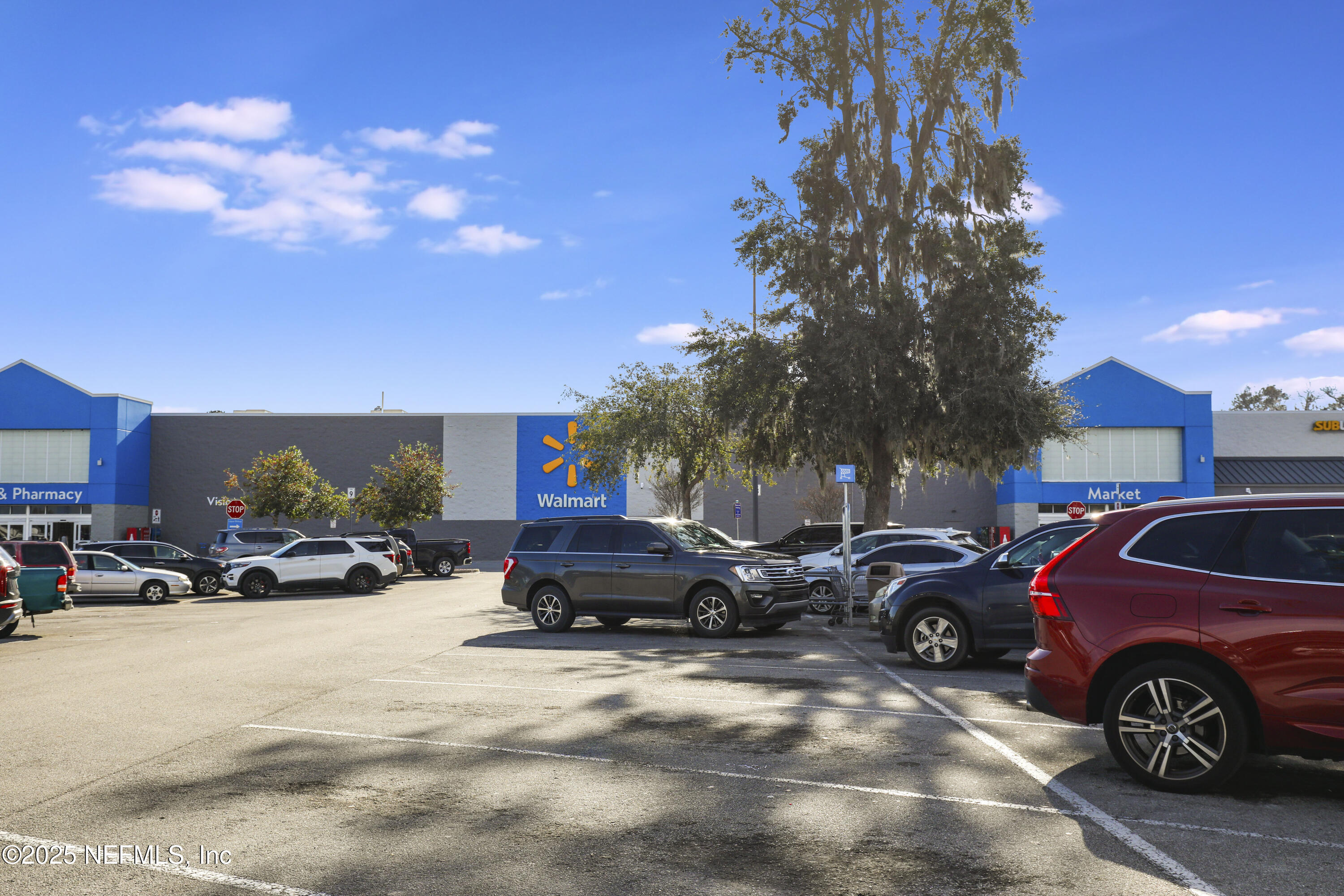 6769 Sandsdale Road Glen St. Mary, FL 32040 - Photo 28 of 31 a view of a cars park in front of a house